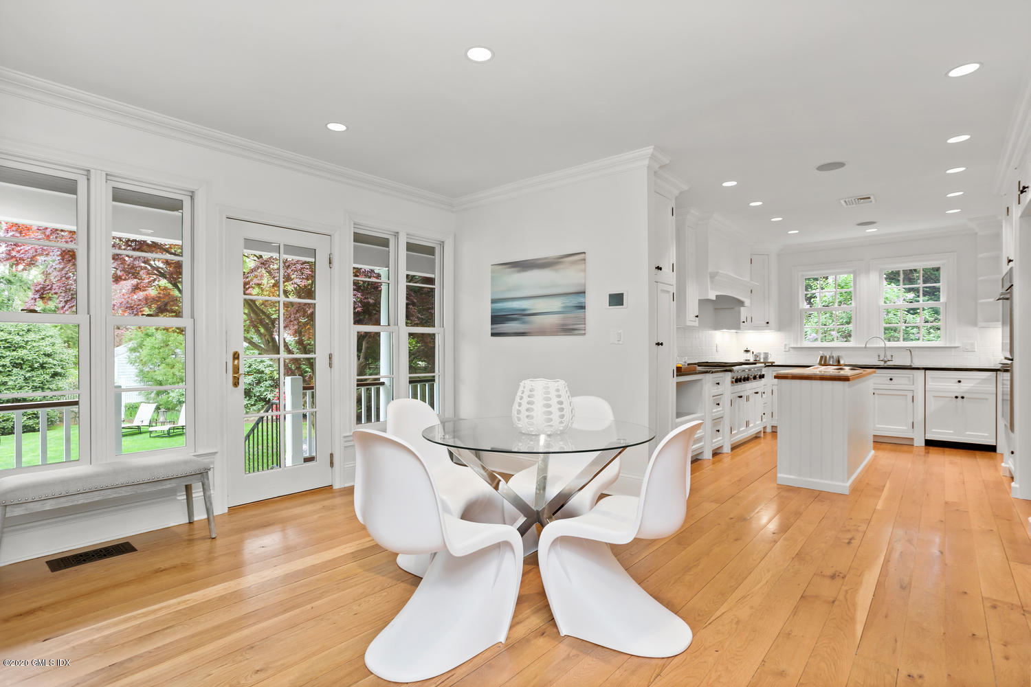 23 Palmer Terrace Riverside, CT 06878 - Photo 11 of 45 a view of a dining room with furniture wooden floor and a chandelier
