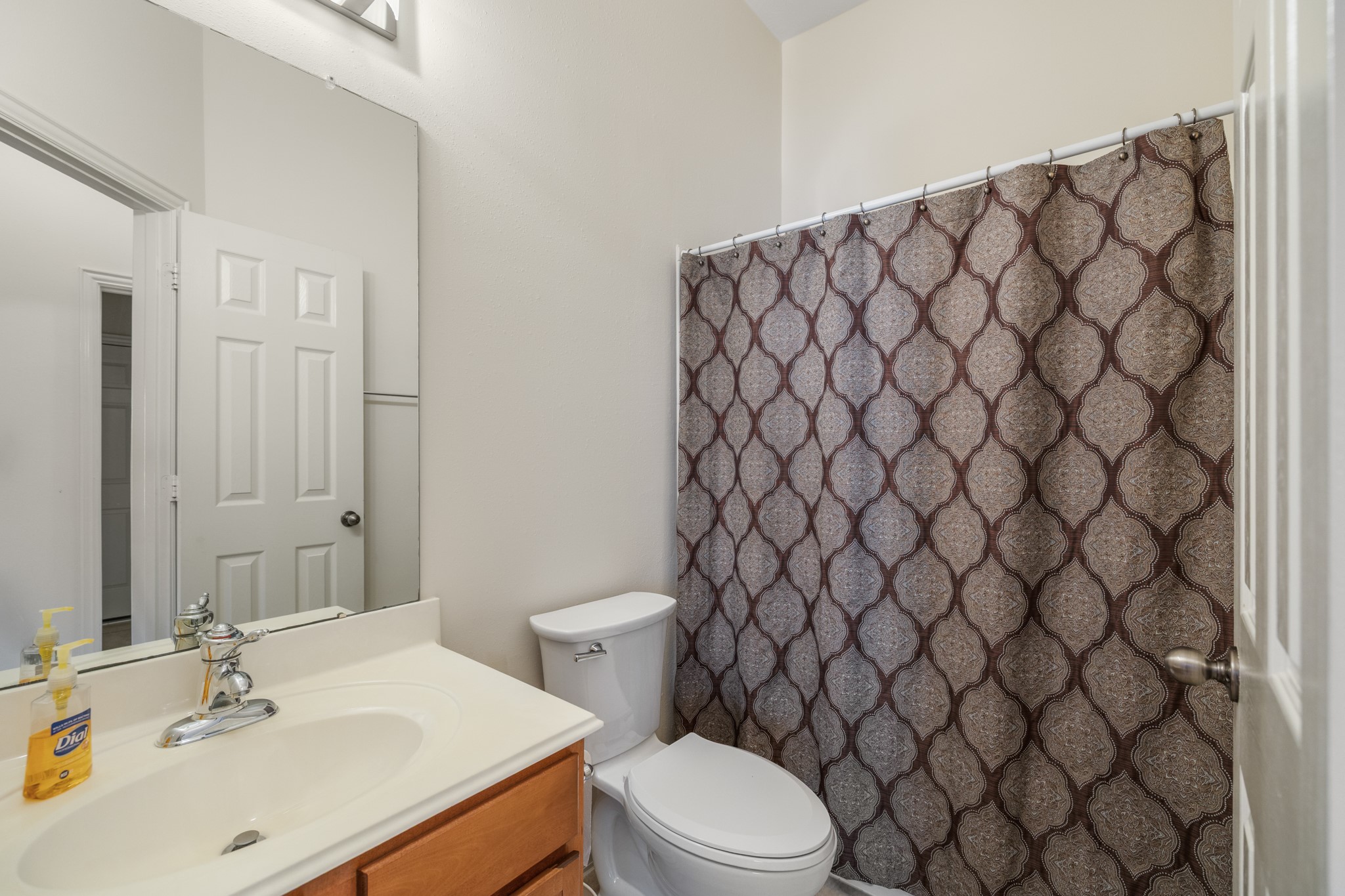 20014 Queens Oak Court Spring, TX 77379 - Photo 24 of 49 a bathroom with a sink and a toilet
