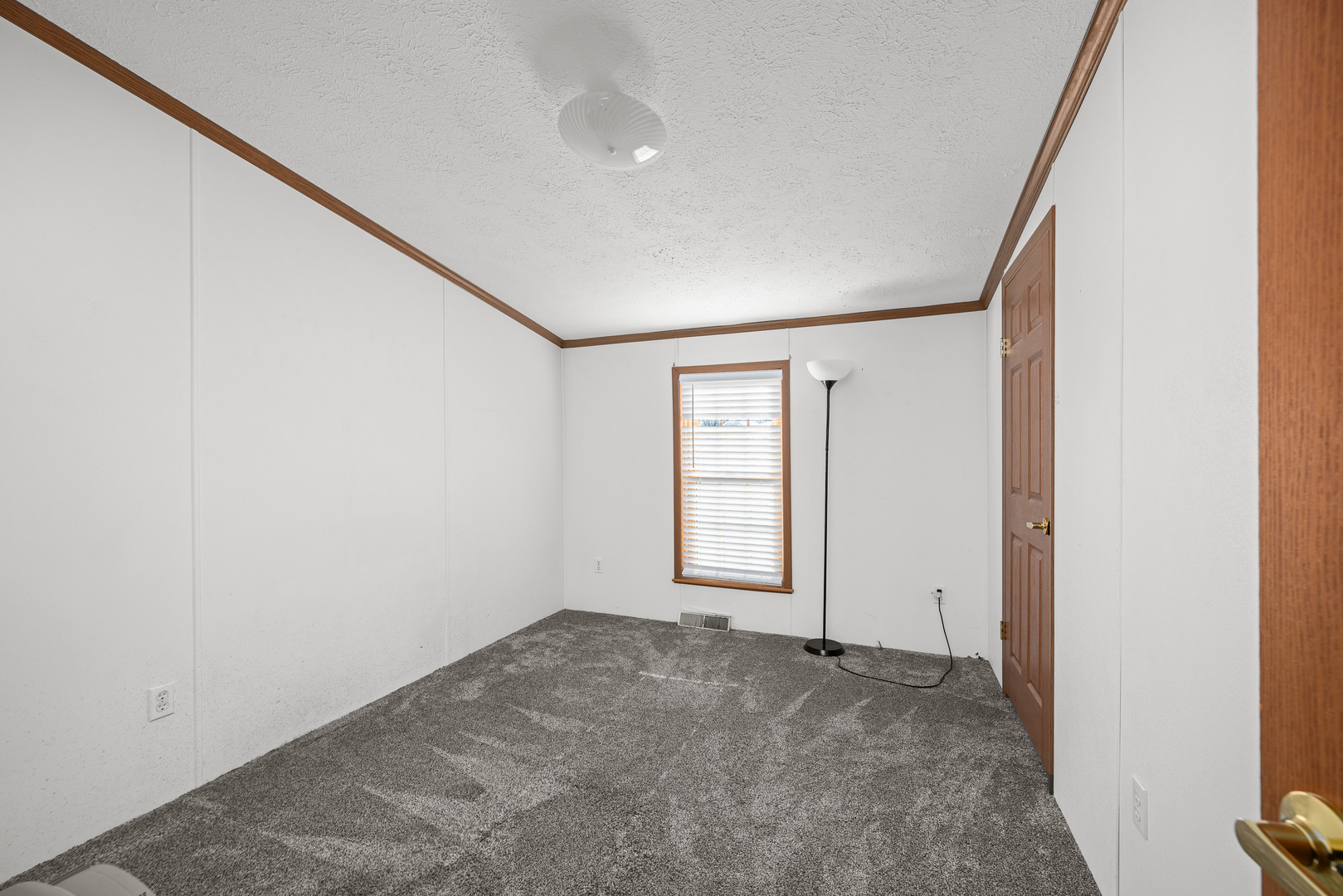 409 233rd Street Aledo, IL 61231 - Photo 25 of 30 an empty room with windows