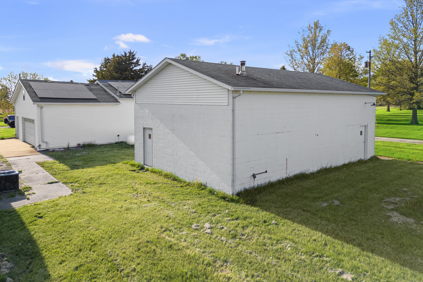 409 233rd Street Aledo, IL 61231 - Photo 8 of 30 a view of a house with a yard