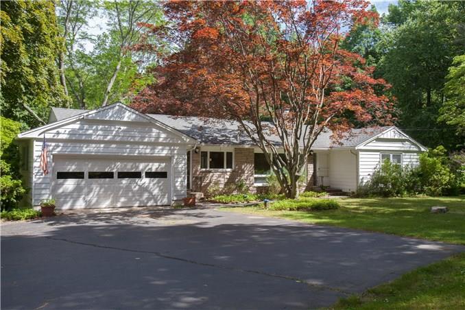 41 Hickory Lane Ridgefield, CT 06877 - Photo 1 of 1 a front view of house with yard and green space