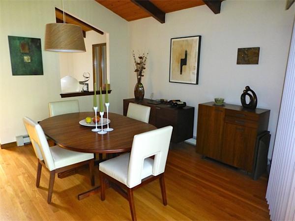 32 Allen Road Easton, MA 02356 - Photo 11 of 21 a dining room with wooden floor a glass table and chairs