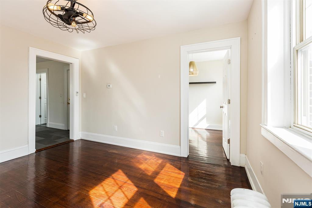 43 Pleasant Way Montclair, NJ 07042 - Photo 12 of 28 wooden floor in a hall with an entryway