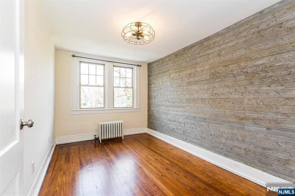 43 Pleasant Way Montclair, NJ 07042 - Photo 18 of 28 a view of a room with wooden floor and a window