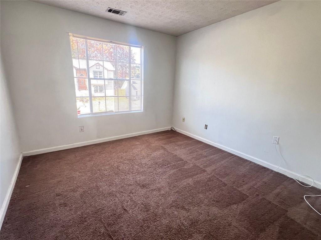 3716 Cress Way Drive Decatur, GA 30034 - Photo 12 of 20 an empty room with a window
