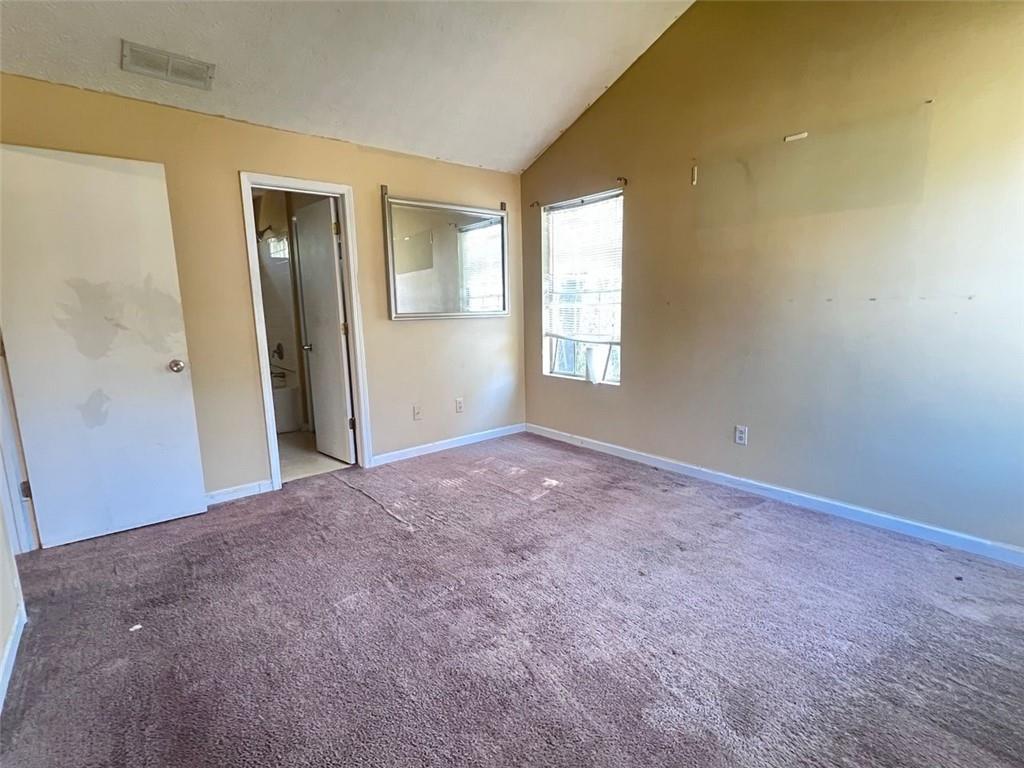 3716 Cress Way Drive Decatur, GA 30034 - Photo 13 of 20 an empty room with windows and closet