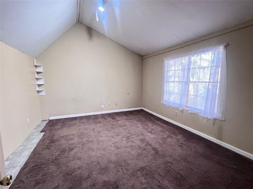 3716 Cress Way Drive Decatur, GA 30034 - Photo 16 of 20 an empty room with a empty space and windows