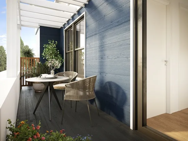 a view of a patio with table and chairs and potted plants