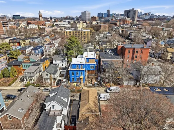 an aerial view of a city with lots of residential buildings