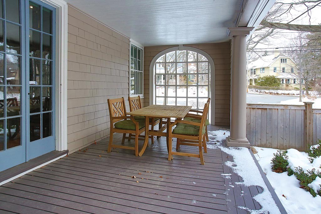 60 Evans Road Brookline, MA 02445 - Photo 14 of 15 a view of a dining room with furniture and wooden floor