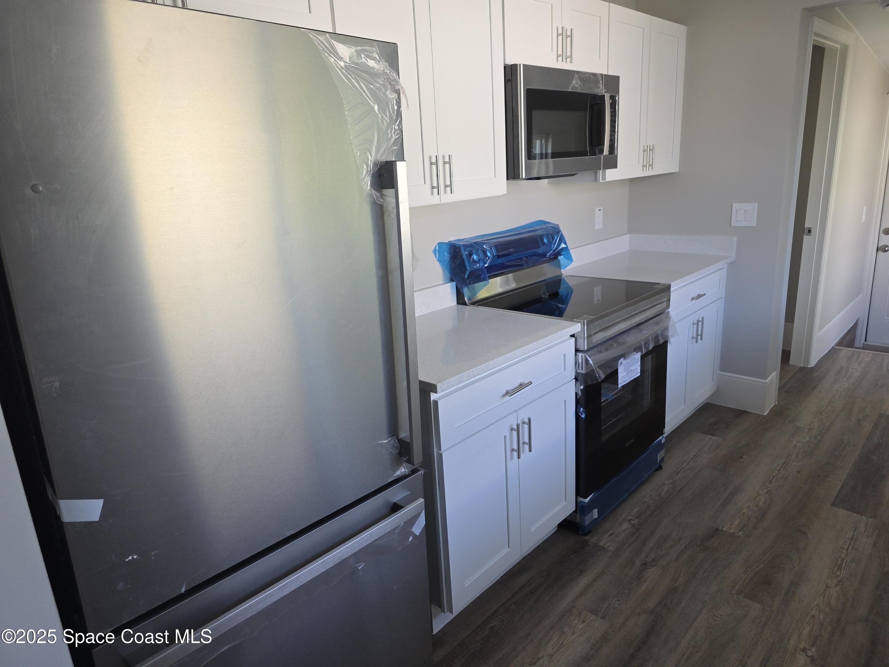 417 Dove Avenue Rockledge, FL 32955 - Photo 4 of 10 417 Dove Kitchen 2