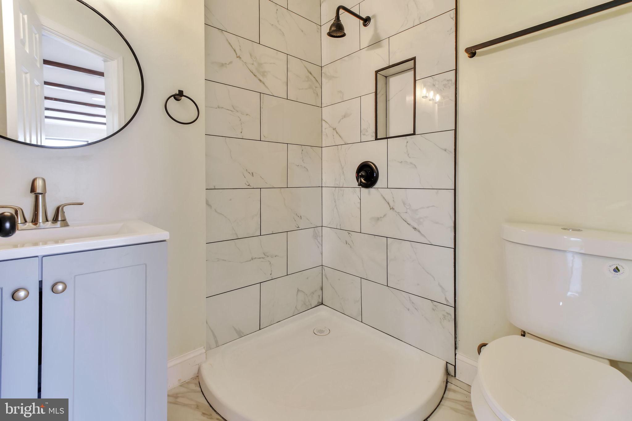 3509 Annandale Road Annandale, VA 22003 - Photo 11 of 26 a bathroom with a toilet and a sink