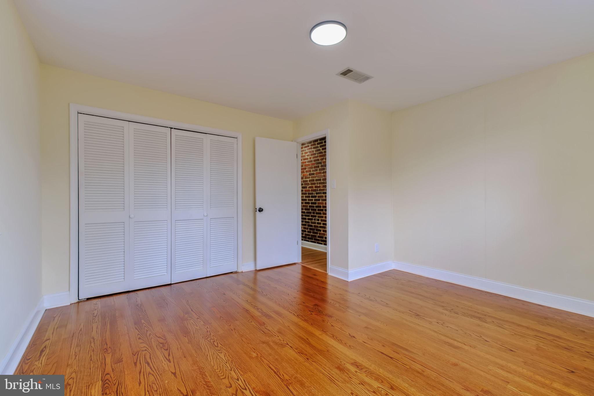 3509 Annandale Road Annandale, VA 22003 - Photo 12 of 26 Bright and airy room with hardwood floors.