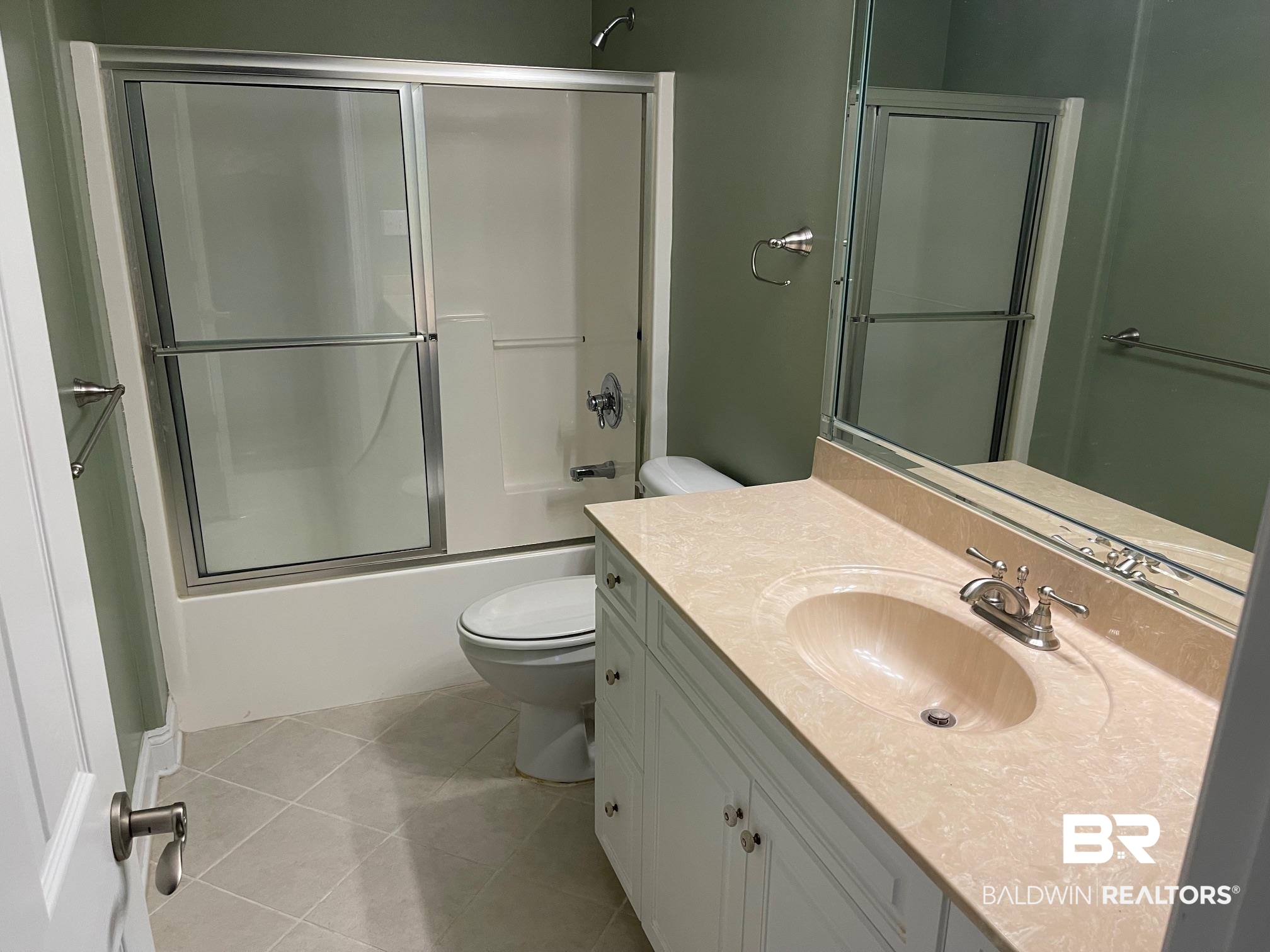 109 Savannah Circle Foley, AL 36535 - Photo 15 of 17 Full bathroom with tile patterned flooring, vanity, combined bath / shower with glass door, and toilet