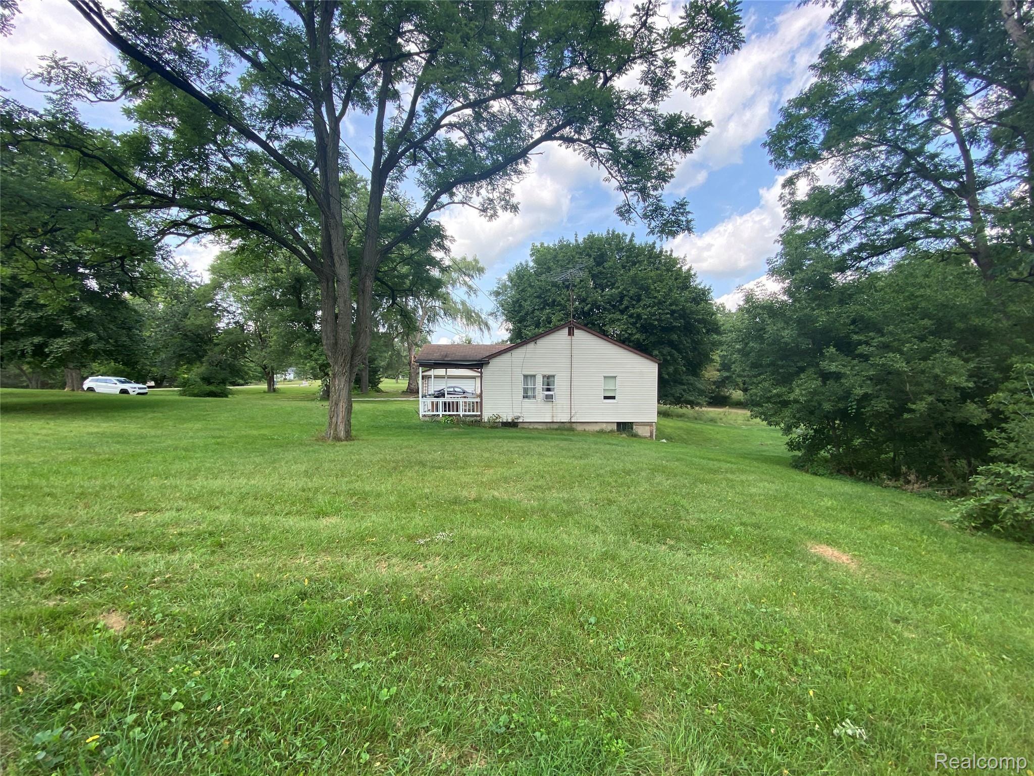 4520 Rattek Road Clarkston, MI 48346 - Photo 7 of 33 Side Lot House.JPG