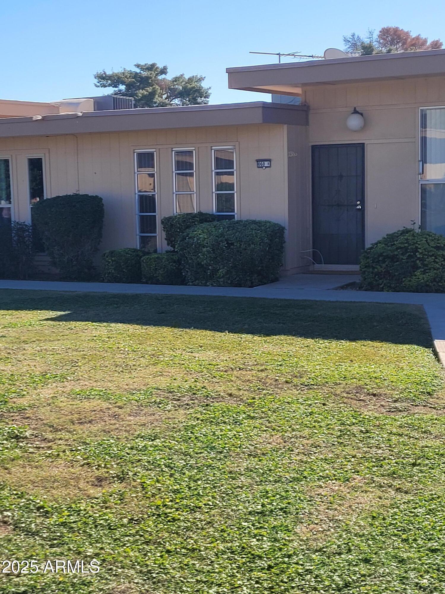 a view of a house with a swimming pool