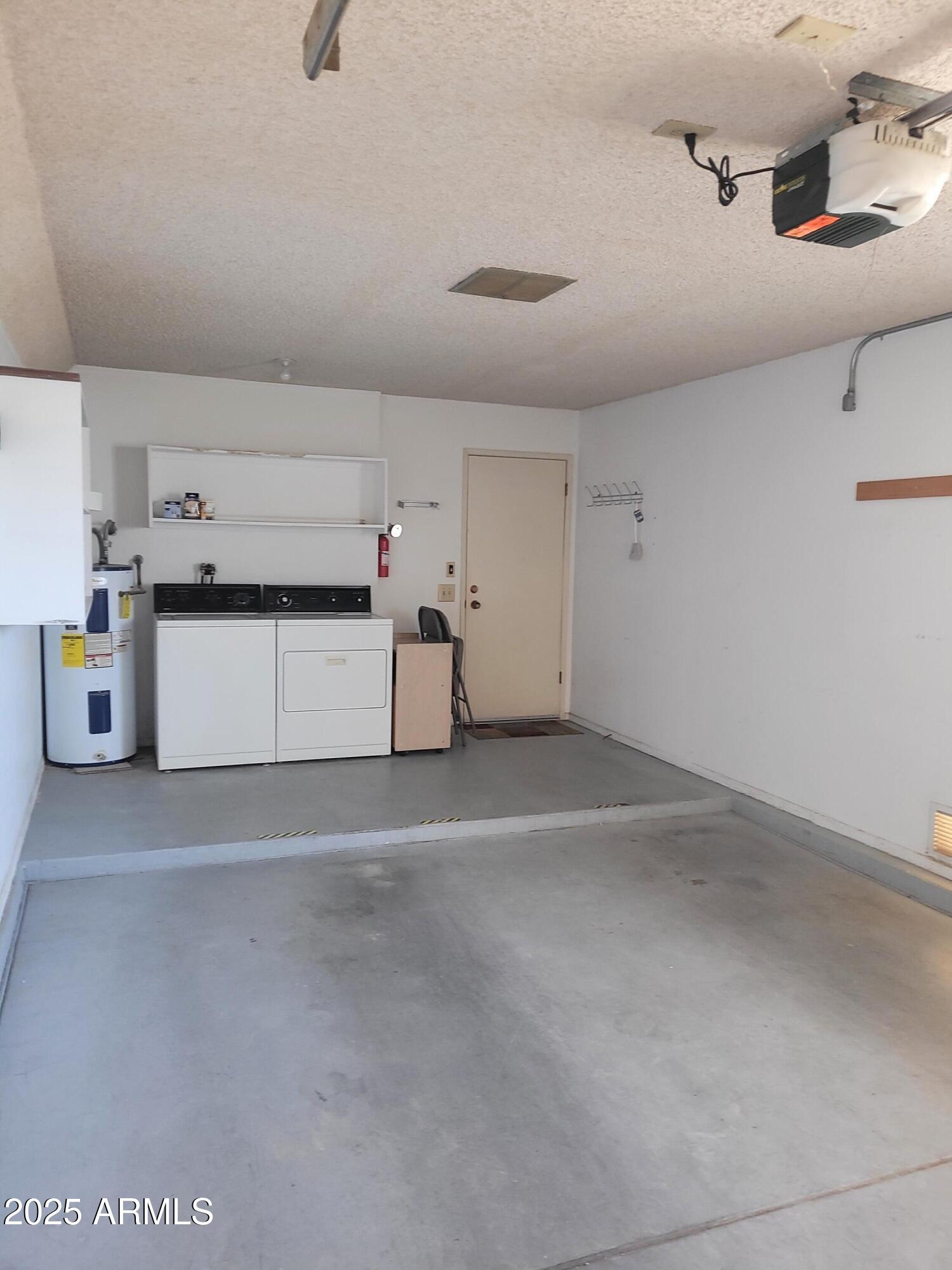 10060 West Royal Oak Road, Unit B Sun City, AZ 85351 - Photo 25 of 26 a view of a storage & utility room with a sink