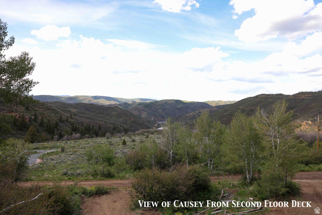 15253 Mill Road, Unit 62 Huntsville, UT 84317 - Photo 35 of 48 Expansive natural landscape with rolling hills and distant mountains