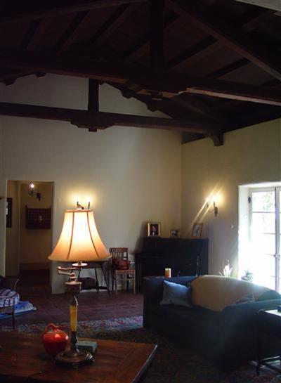 410 Tico Road Ojai, CA 93023 - Photo 4 of 10 a living room with furniture a lamp and a window