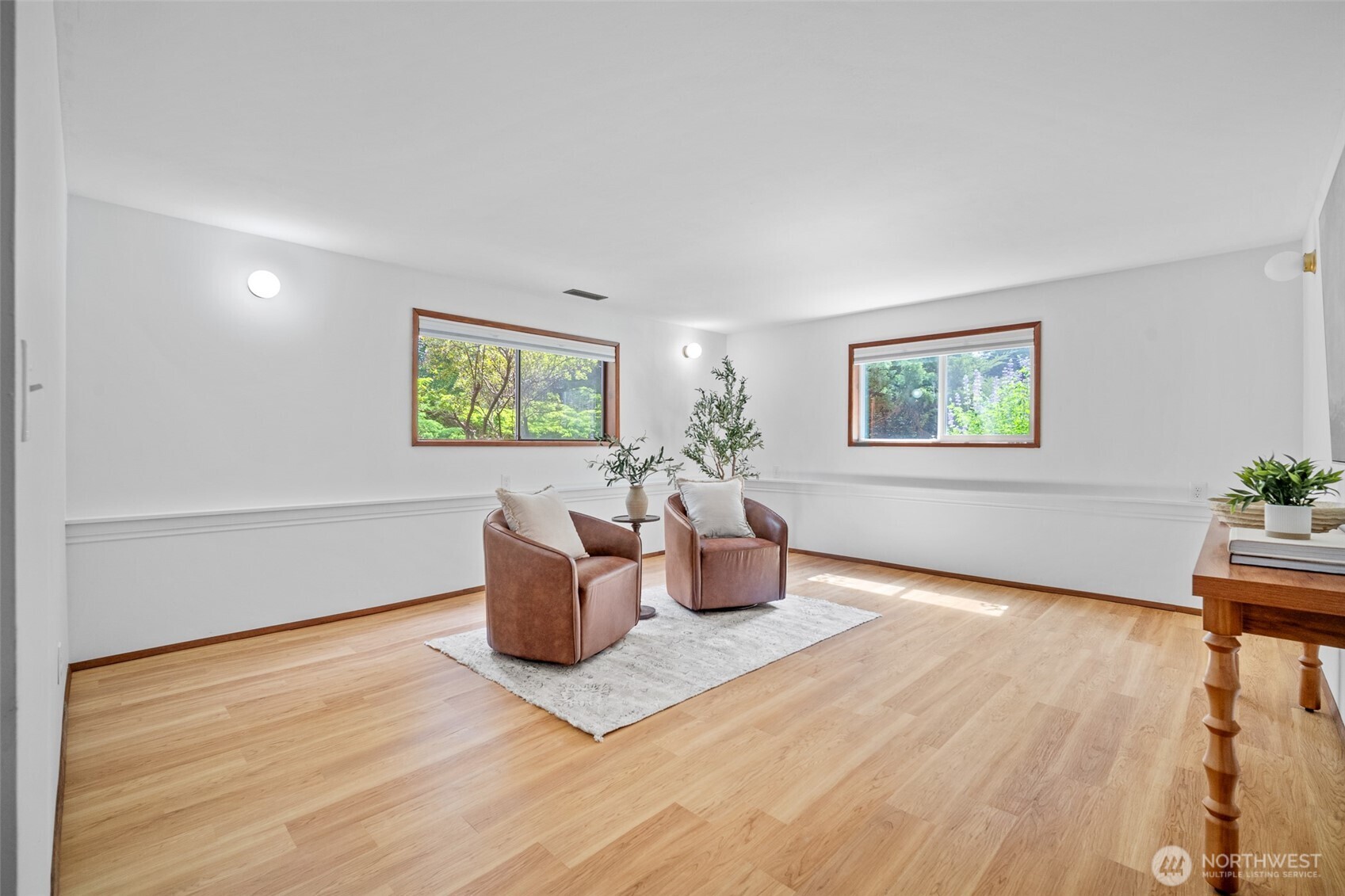 2357 Yew Street Road Bellingham, WA 98229 - Photo 23 of 40 a living room with furniture a window and a potted plant