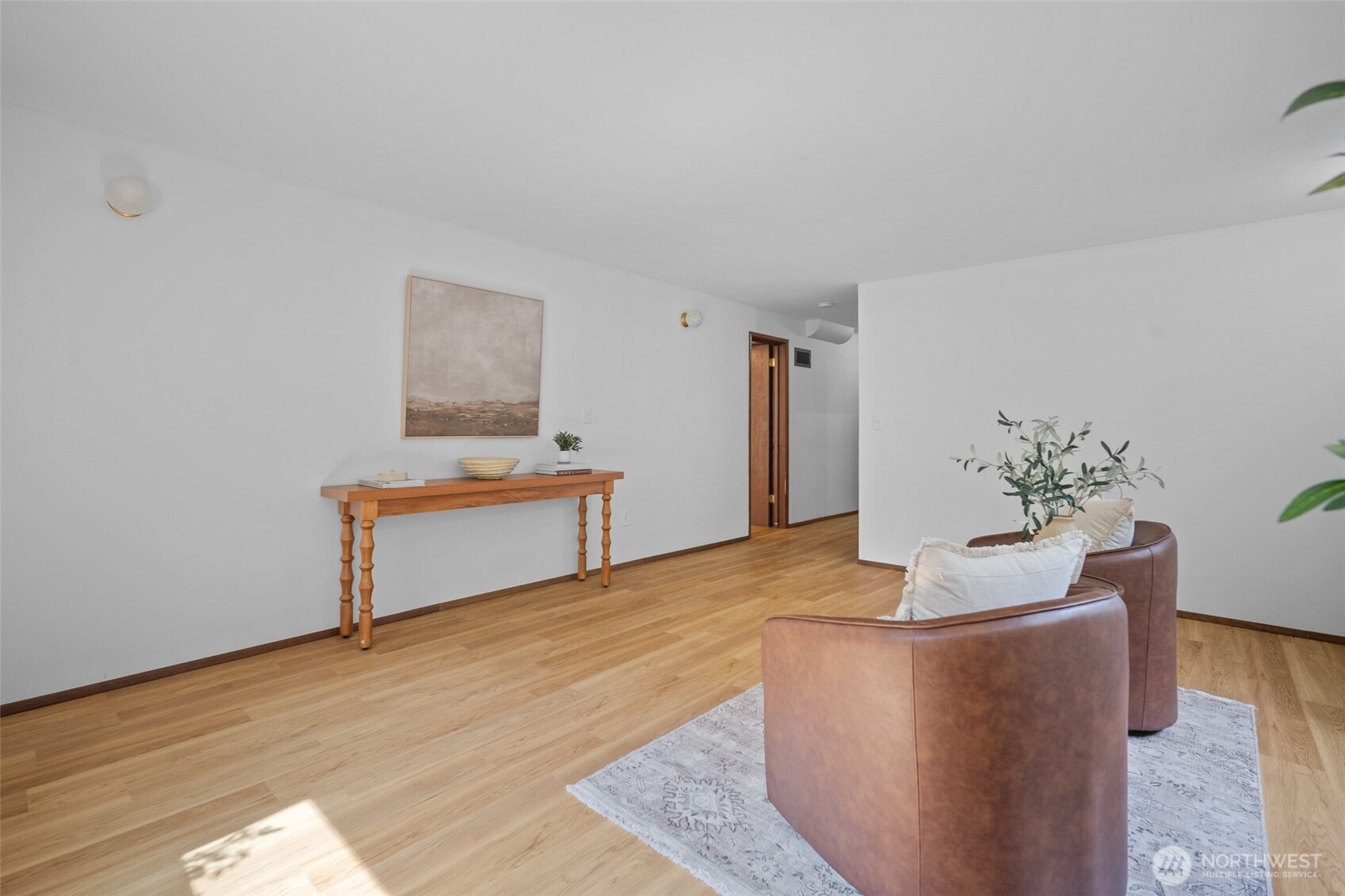 2357 Yew Street Road Bellingham, WA 98229 - Photo 24 of 40 a living room with furniture and wooden floor