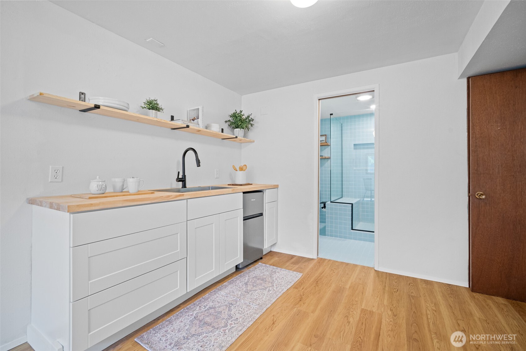 2357 Yew Street Road Bellingham, WA 98229 - Photo 25 of 40 a bathroom with a sink and a mirror