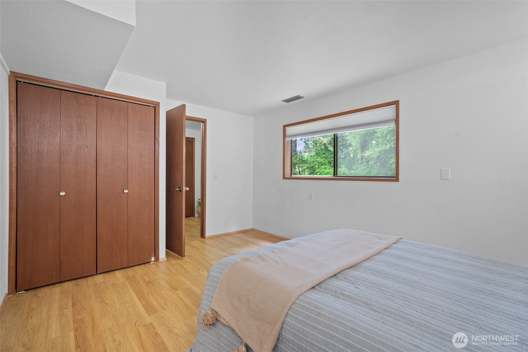 2357 Yew Street Road Bellingham, WA 98229 - Photo 29 of 40 a bedroom with a bed and a window