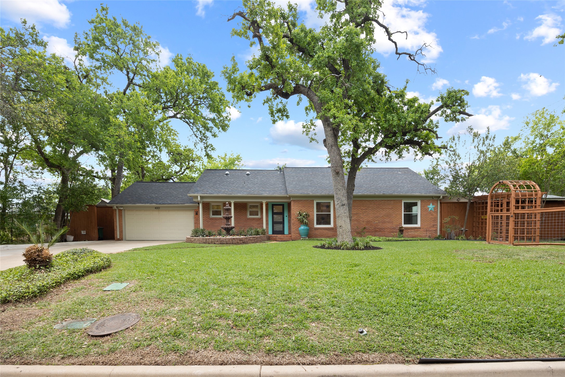 front view of a house with a yard