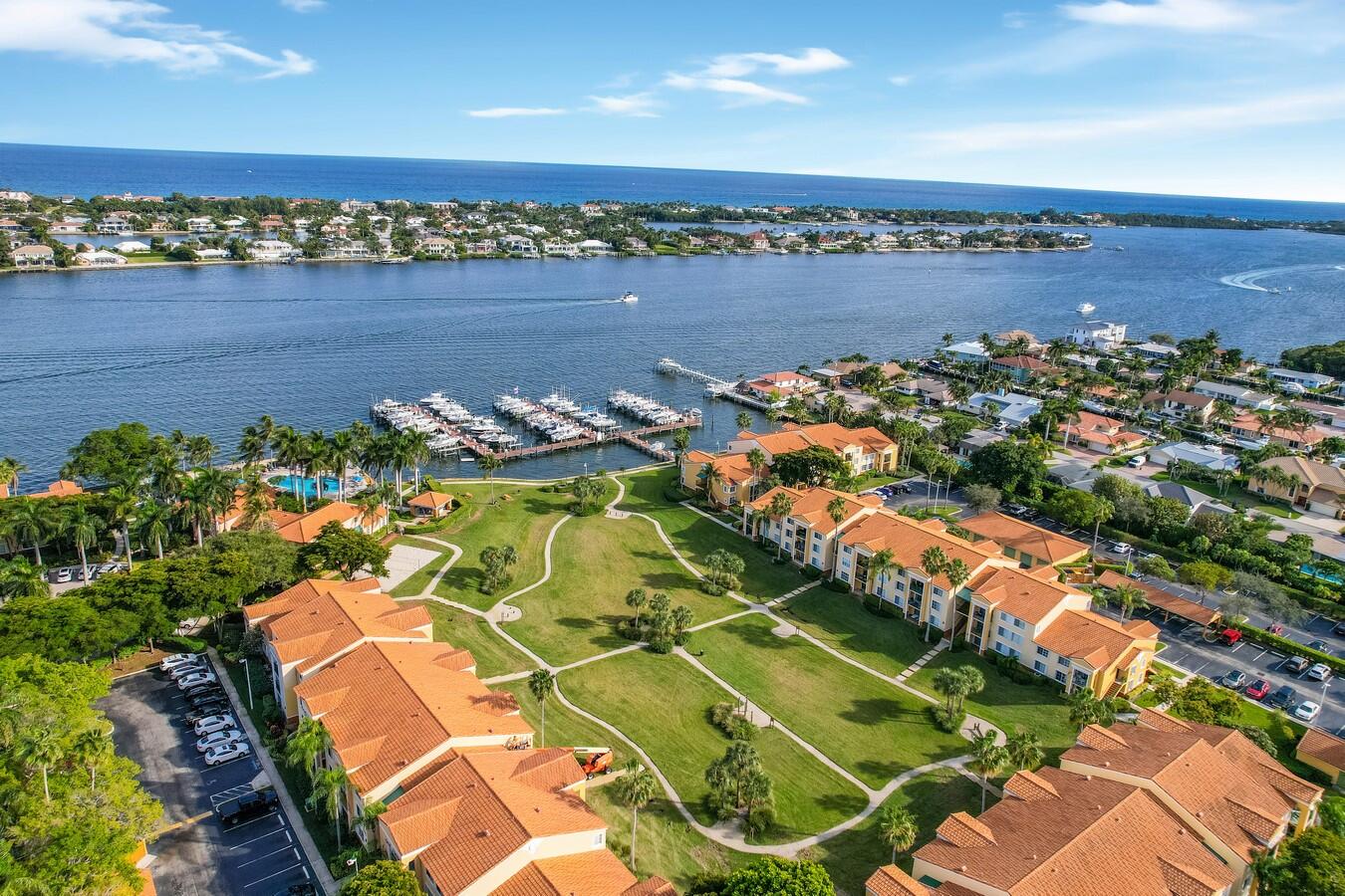 an aerial view of a residential houses with outdoor space