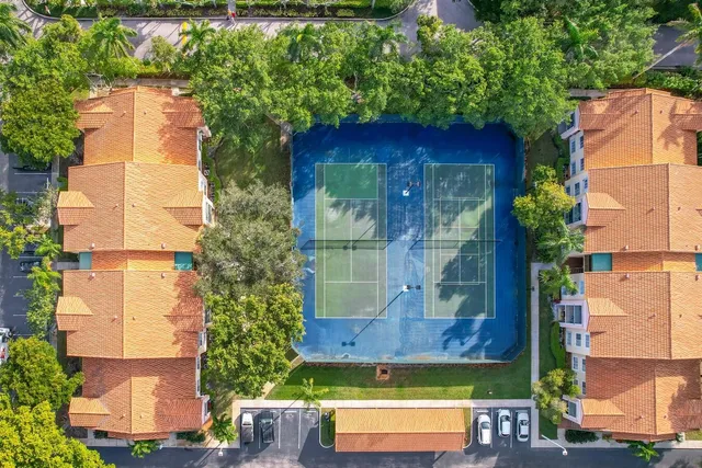 an aerial view of a house with a garden