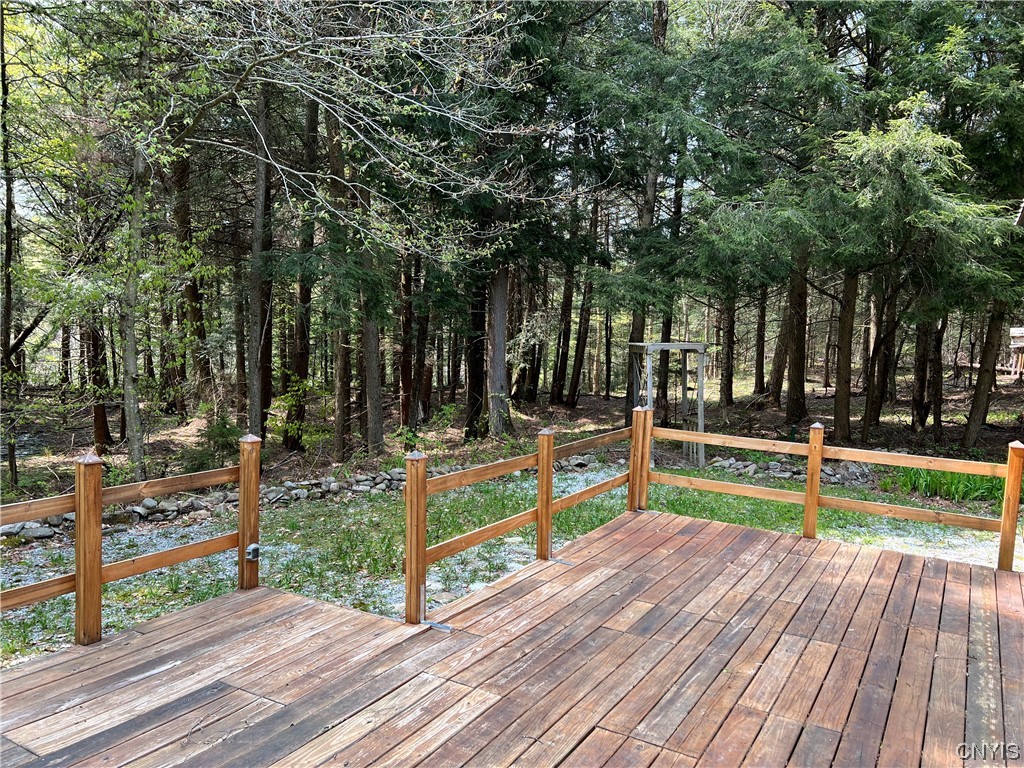 4893 West Ava Road Ava, NY 13471 - Photo 14 of 50 Rear deck with the sound of the creek in the dista
