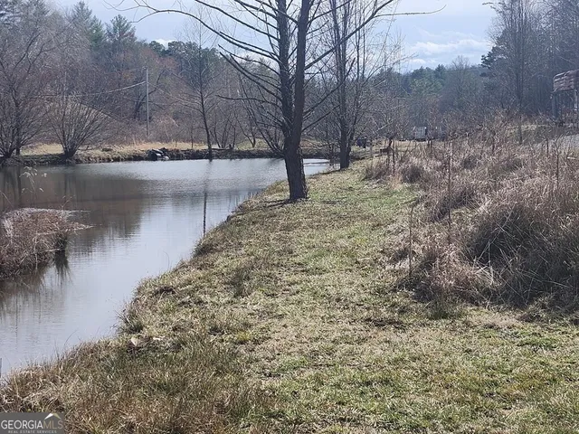 a view of lake with outdoor space