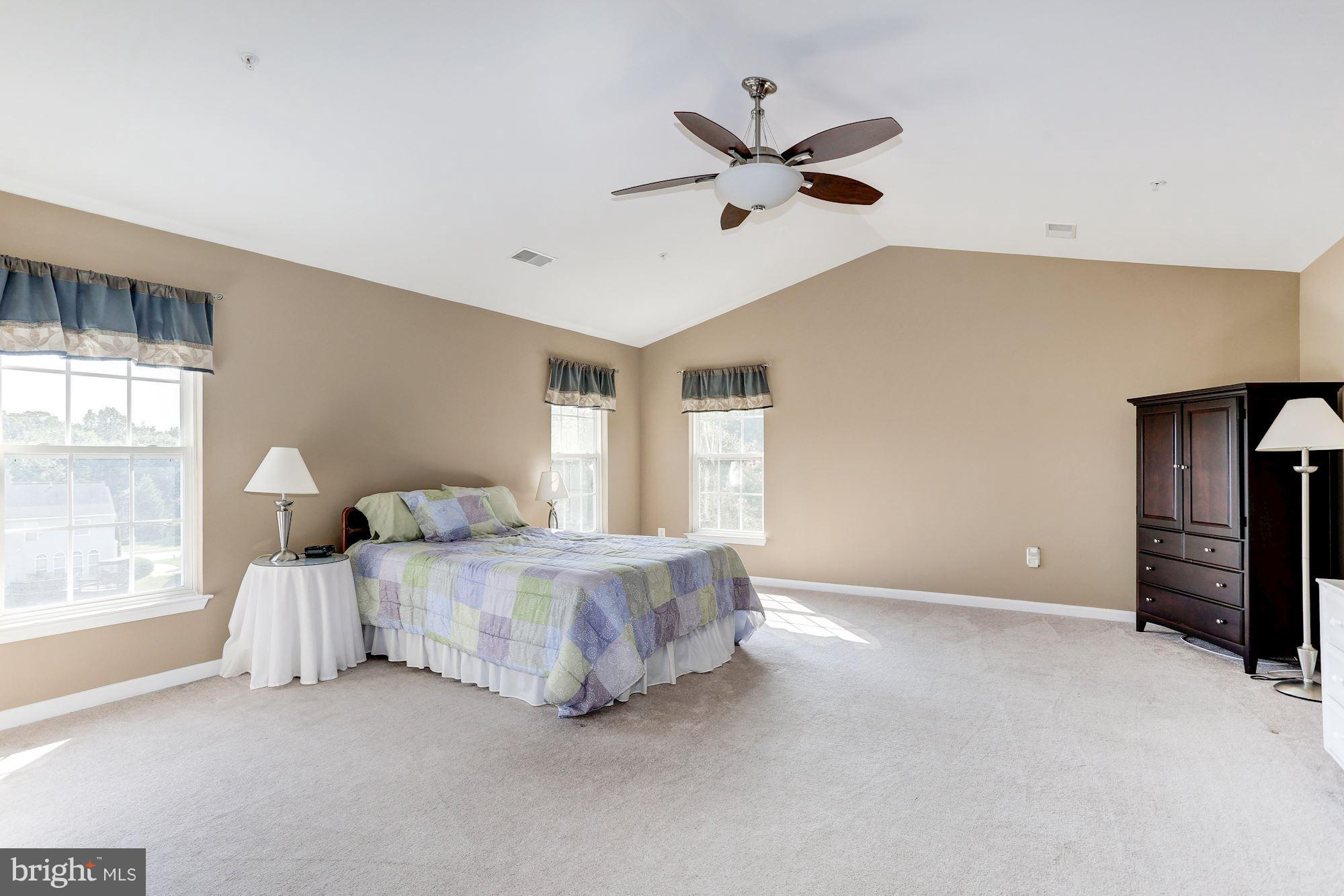 15115 Red Ridge Place Bowie, MD 20715 - Photo 13 of 30 Master bedroom with vaulted ceilings
