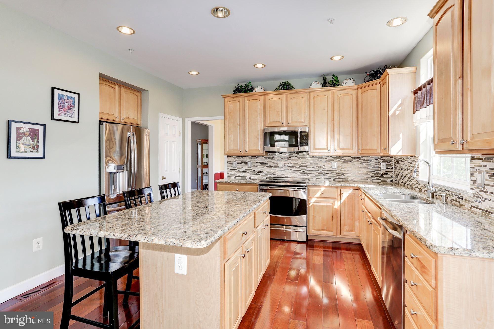 15115 Red Ridge Place Bowie, MD 20715 - Photo 7 of 30 Gourmet kitchen with breakfast bar
