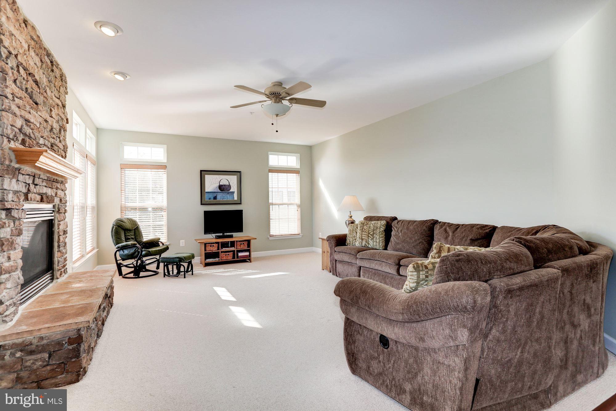 15115 Red Ridge Place Bowie, MD 20715 - Photo 10 of 30 Famiy room with gas fireplace