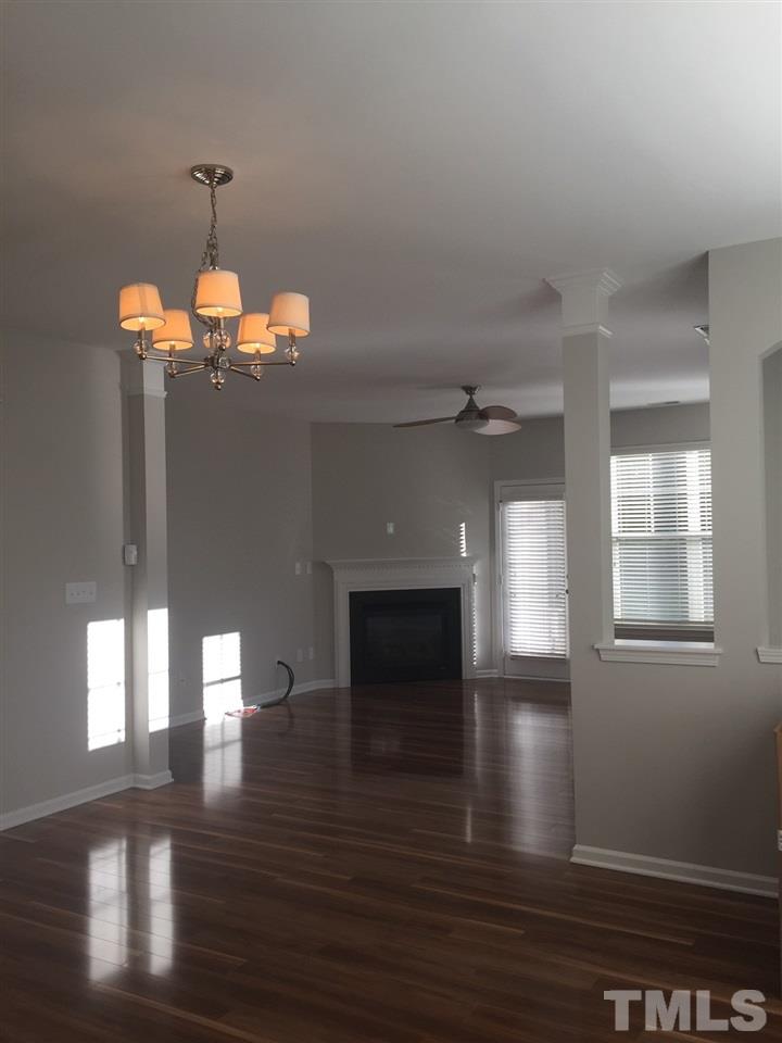 8499 Central Drive Raleigh, NC 27613 - Photo 3 of 4 a view of a room with wooden floor