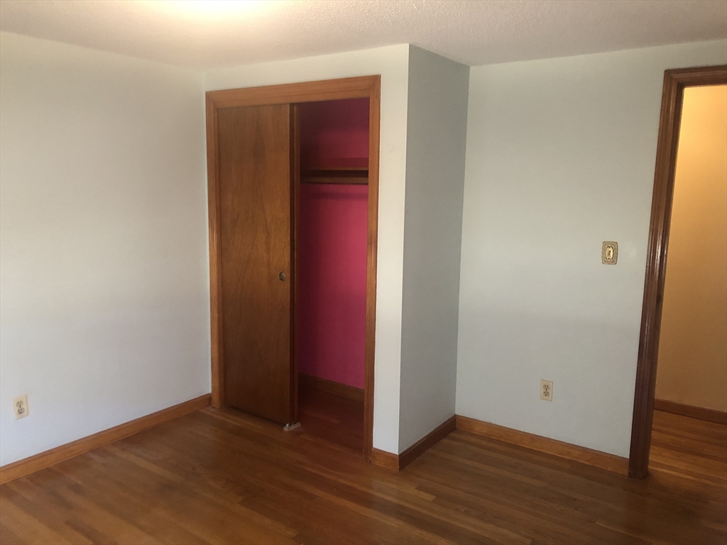 521 Franklin Street Whitman, MA 02382 - Photo 17 of 30 a view of a room with wooden floor
