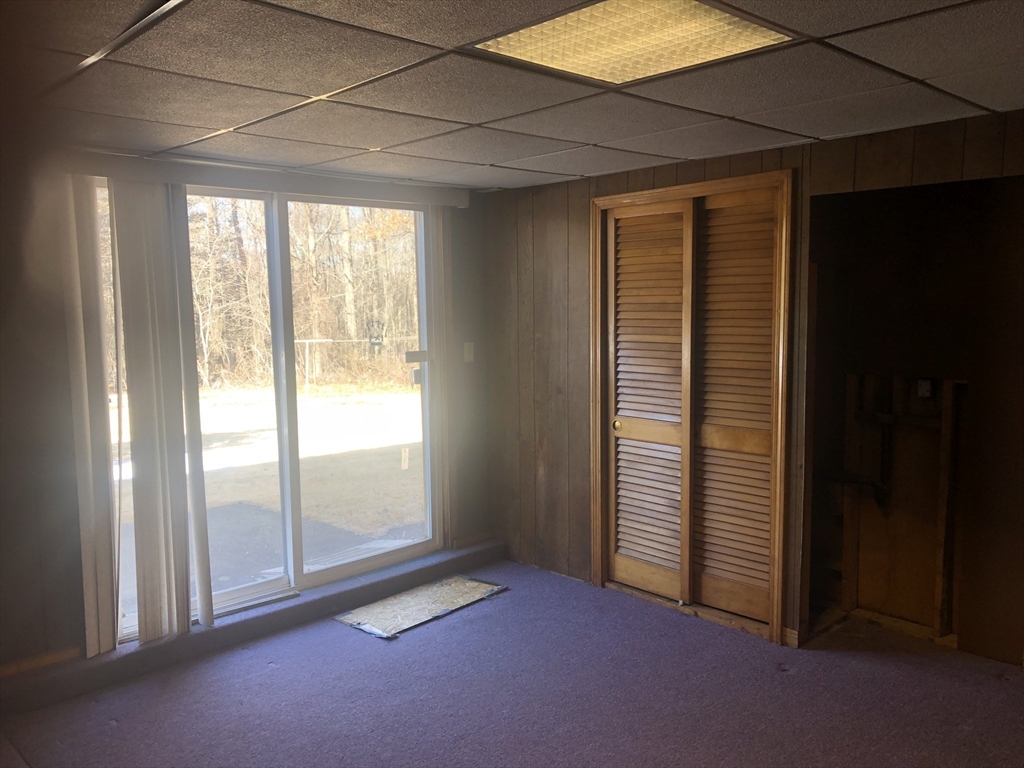 521 Franklin Street Whitman, MA 02382 - Photo 22 of 30 an empty room with windows