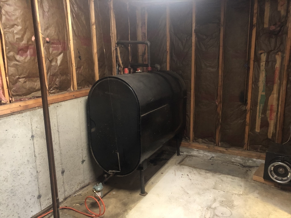 521 Franklin Street Whitman, MA 02382 - Photo 24 of 30 a room with a mirror