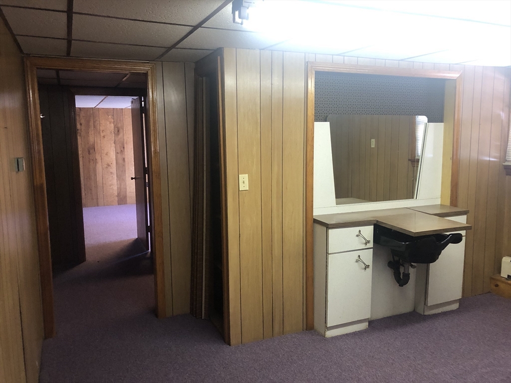 521 Franklin Street Whitman, MA 02382 - Photo 27 of 30 a view of hallway with a mirror