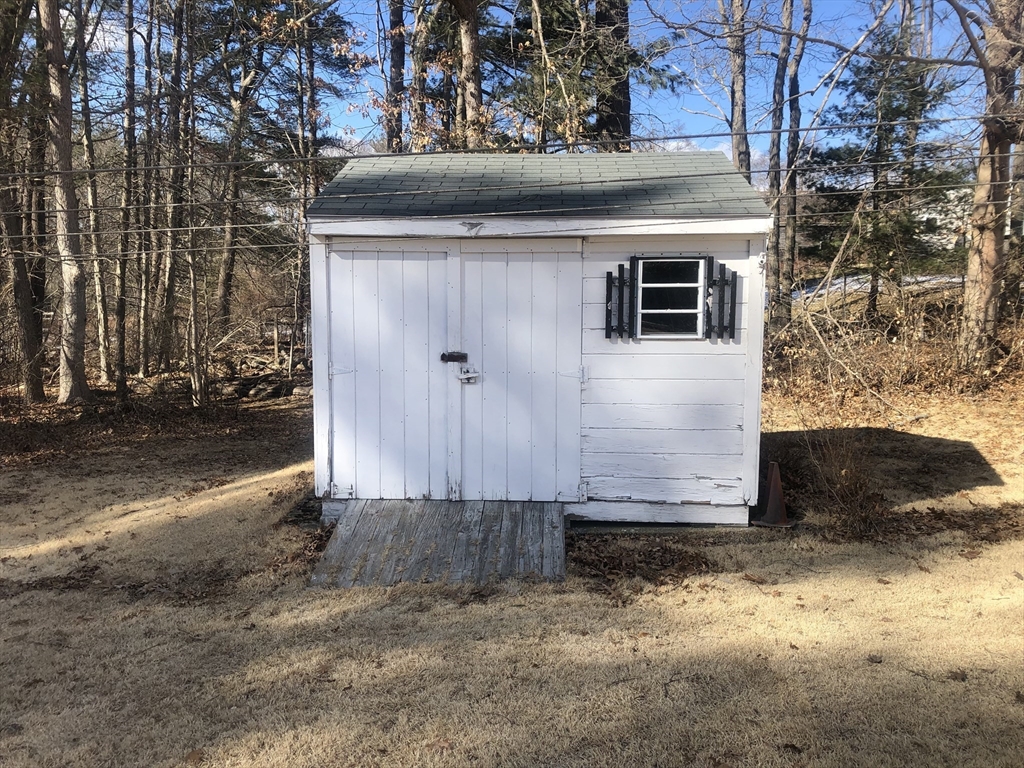 521 Franklin Street Whitman, MA 02382 - Photo 4 of 30 a view of a house with a yard
