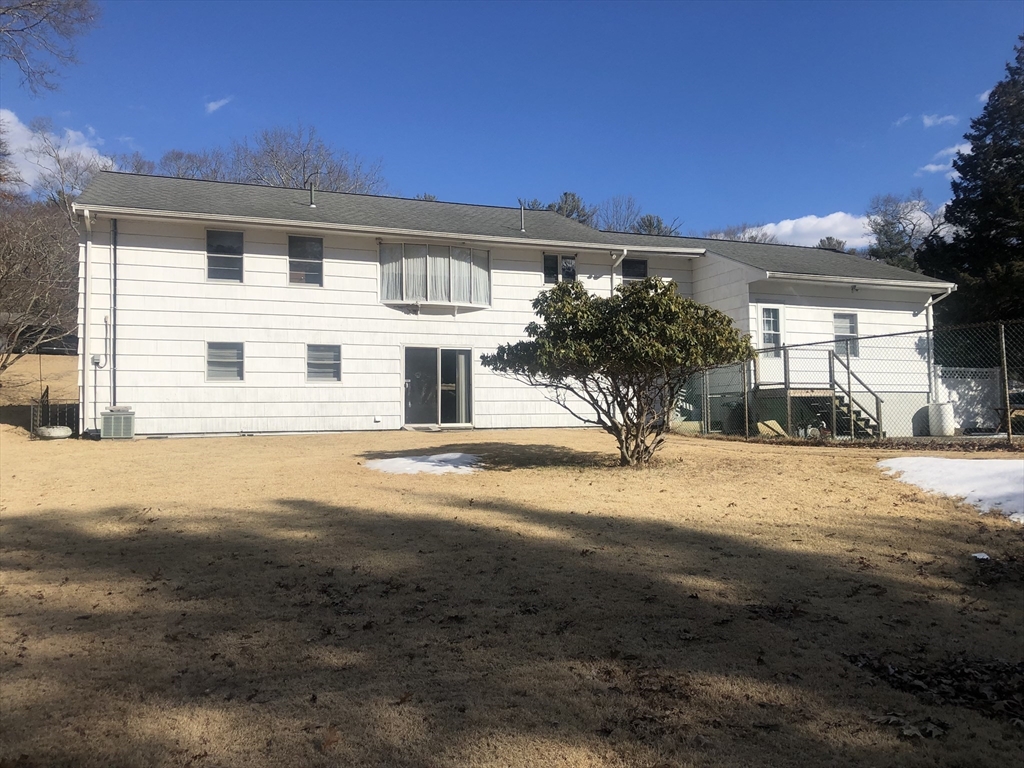 521 Franklin Street Whitman, MA 02382 - Photo 5 of 30 a view of a house with a yard