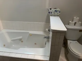 a bathroom with a sink and toilet