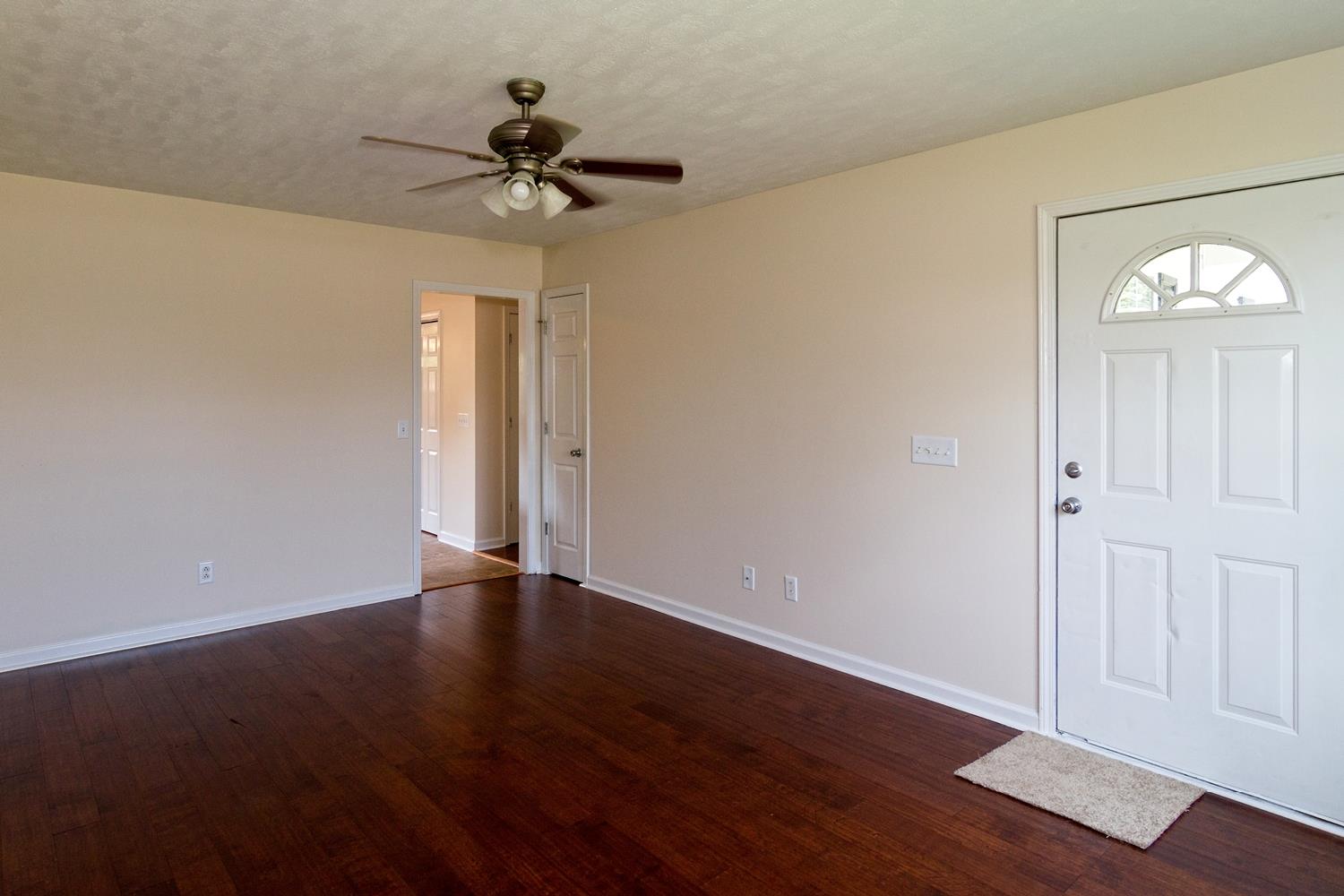 1215 5th Avenue West Springfield, TN 37172 - Photo 3 of 10 a view of an empty room with a window