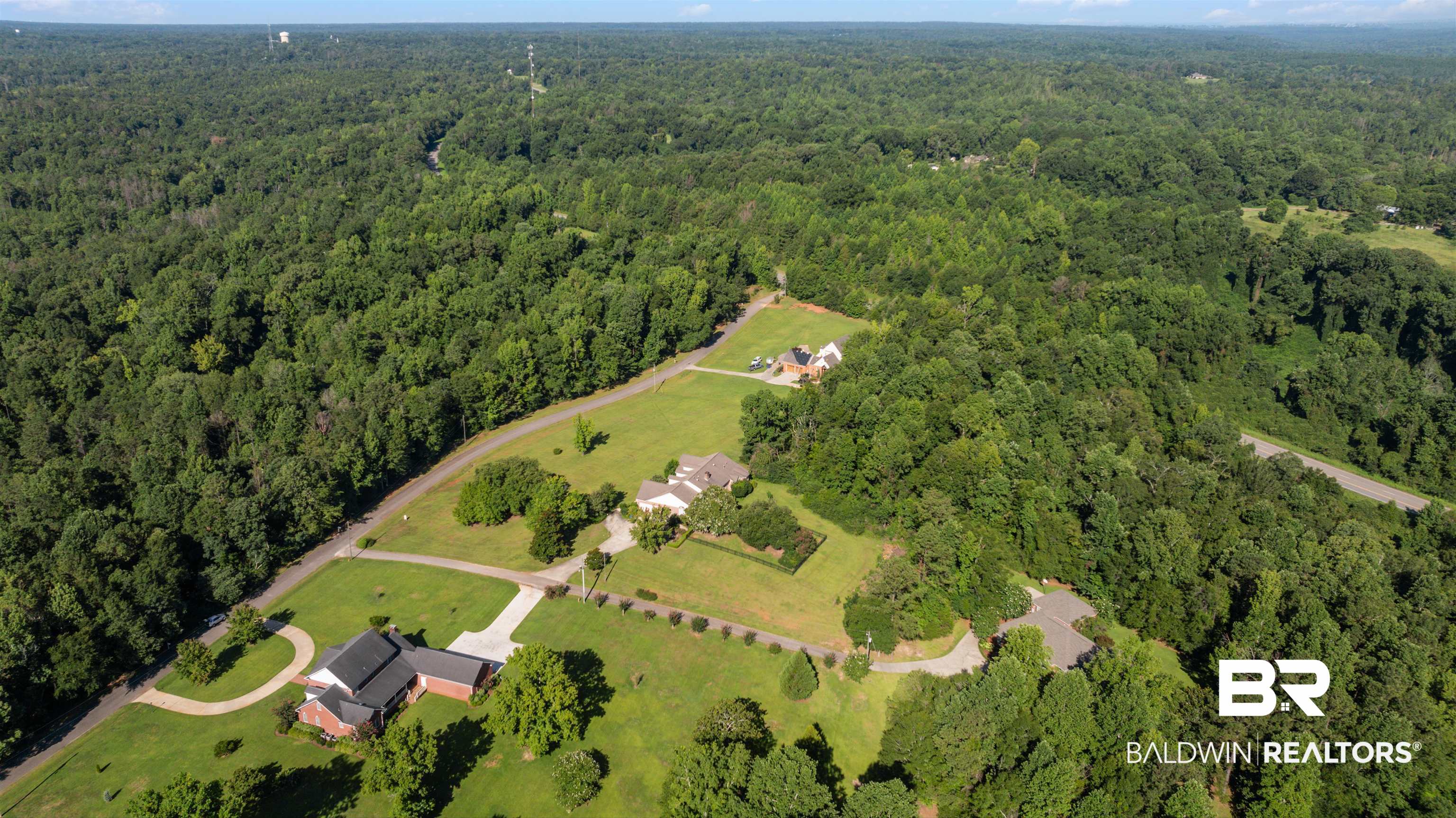 141 Blue Ridge Drive Monroeville, AL 36460 - Photo 37 of 40 Aerial view of property and surrounding area featuring a forest
