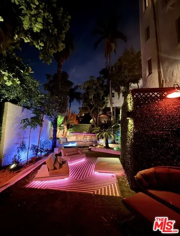 a view of swimming pool from a balcony