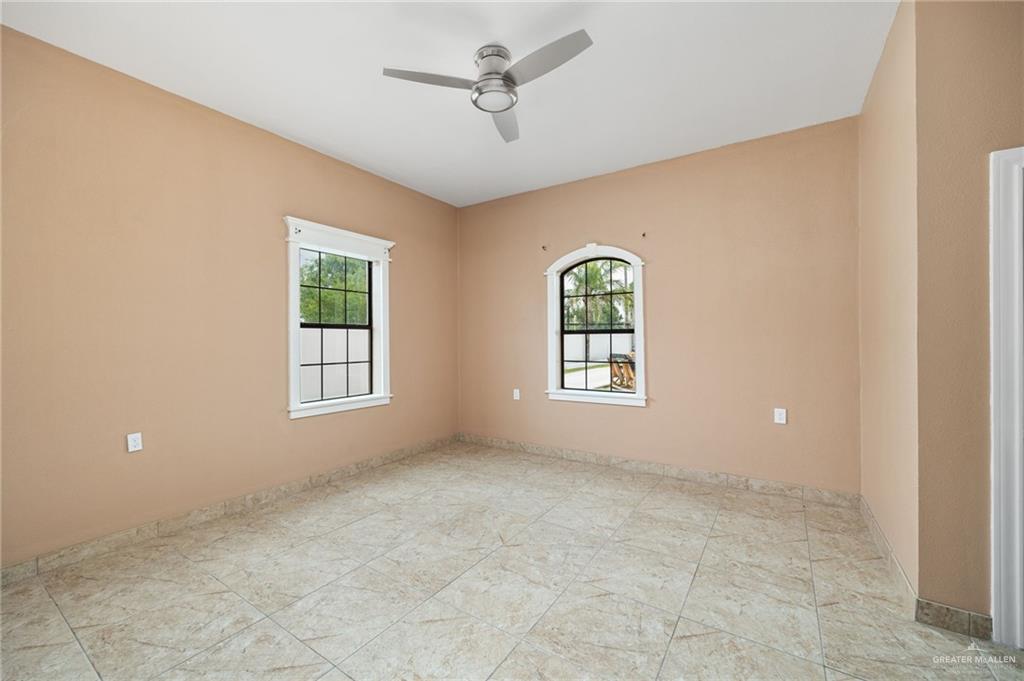 5056 Mile 8 Road Edinburg, TX 78541 - Photo 15 of 34 a view of an empty room with a window