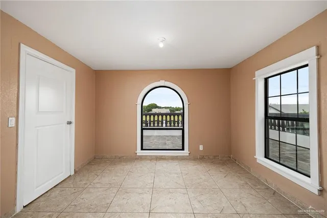 a view of balcony with furniture