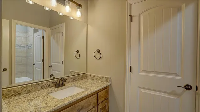 a bathroom with a sink a toilet and bathtub