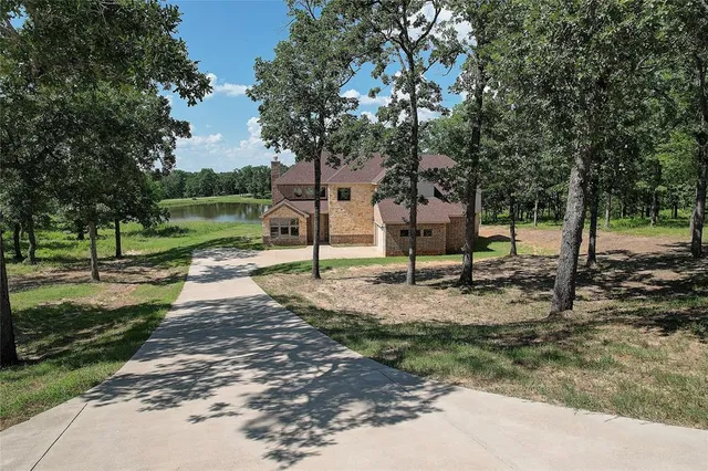 a view of a golf course with a lake